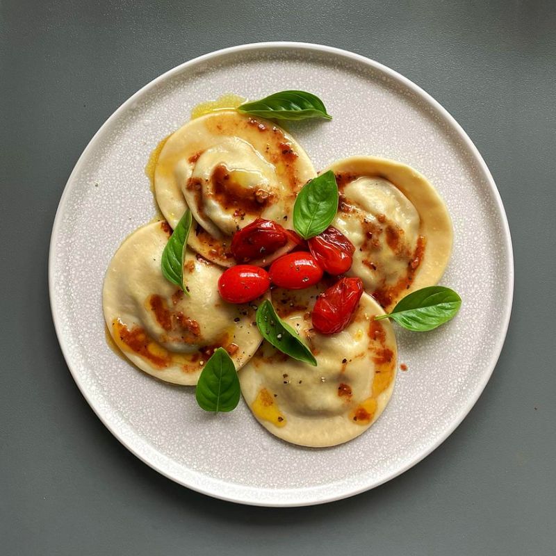 Eggplant and Mozzarella Ravioli With Charred Red Pepper Sauce
