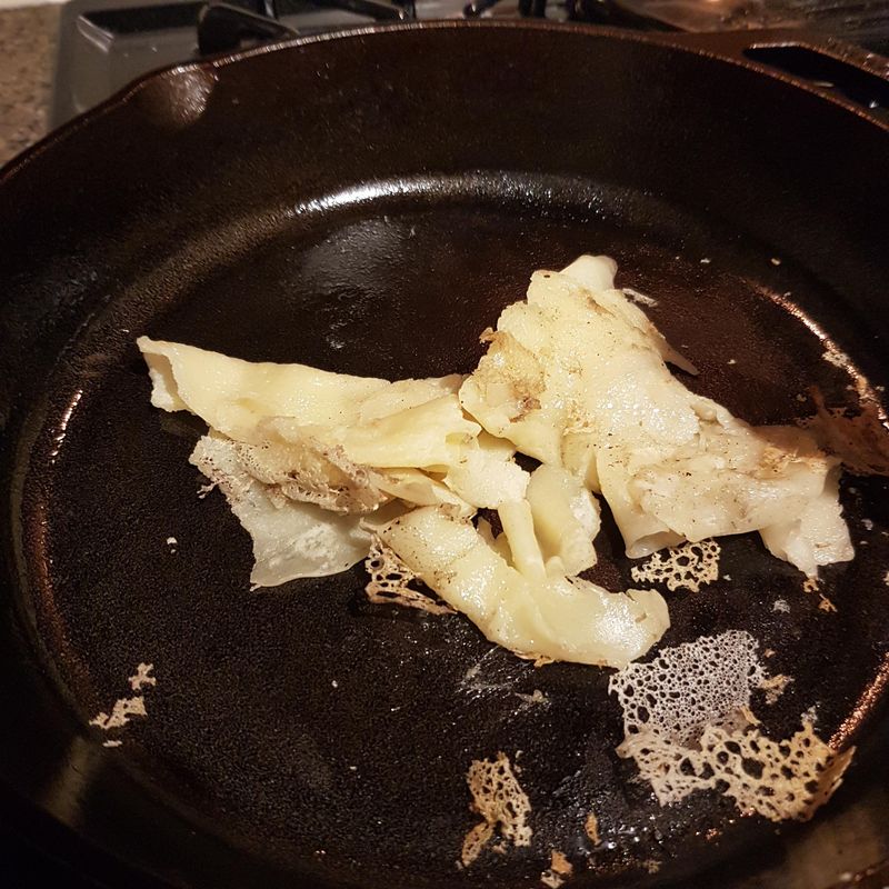 Pancakes in a not-yet-seasoned pan