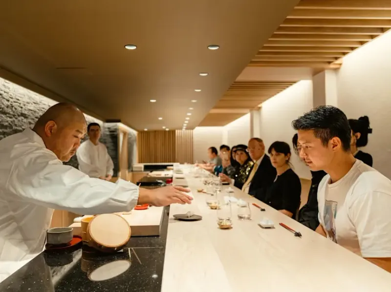 Starting to eat before the host signals it