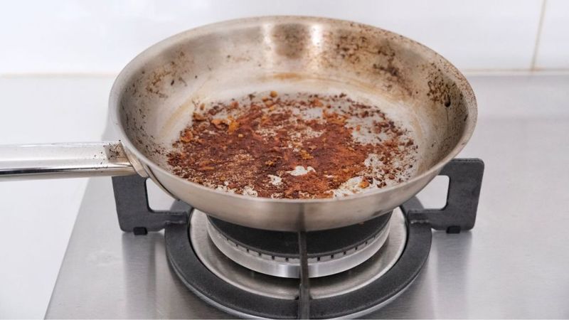 Cool it and use it for soaking stuck-on pans