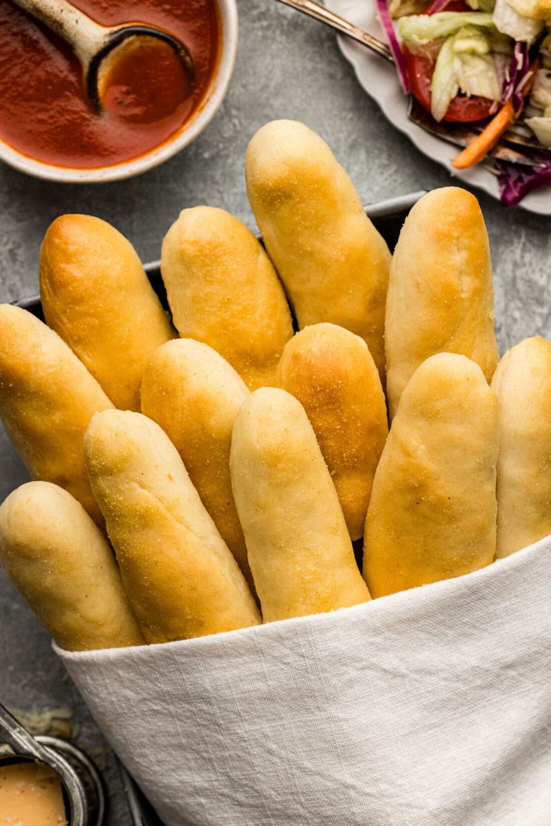 Breadsticks are better hot, so ask if they are fresh