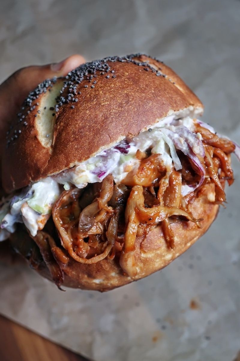 Create pulled pork with shredded oyster mushrooms