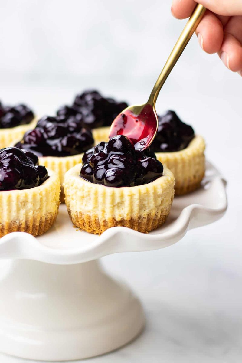 Mini cheesecakes with berry sauce