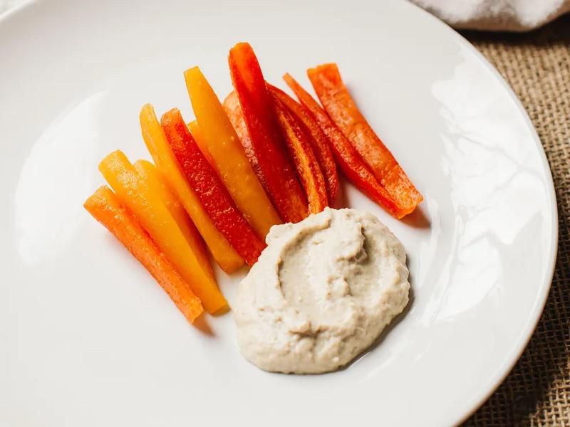 Hummus with bell pepper strips
