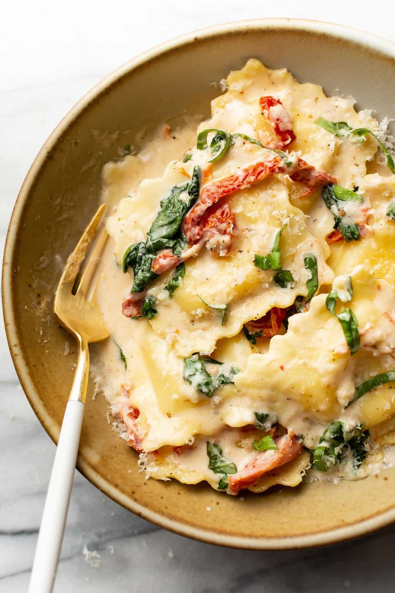 Italian Sausage and Ricotta Ravioli With Creamy Tuscan Sauce