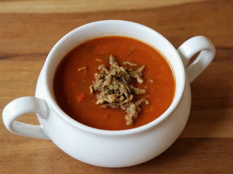 Turtle soup (permitted in some places vs. restricted in many)