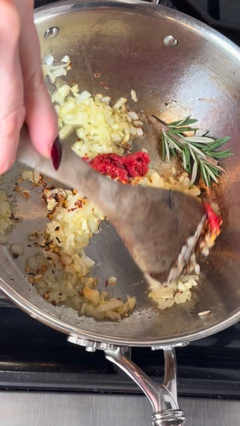 Blooming spices and tomato paste