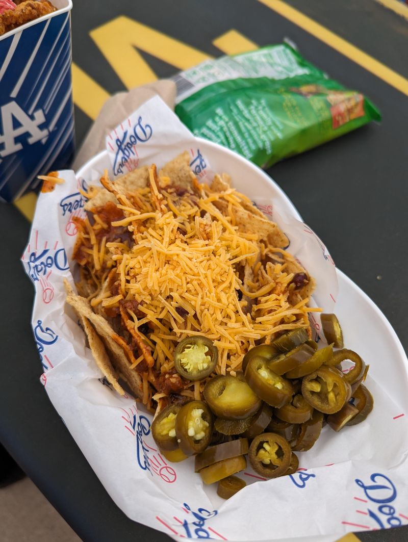 Cold cheese on hot chips or hot cheese on cold chips