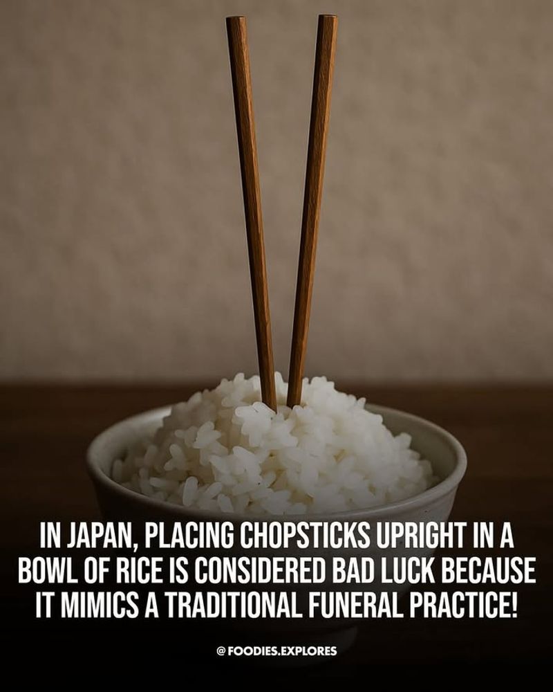 Putting chopsticks upright in rice