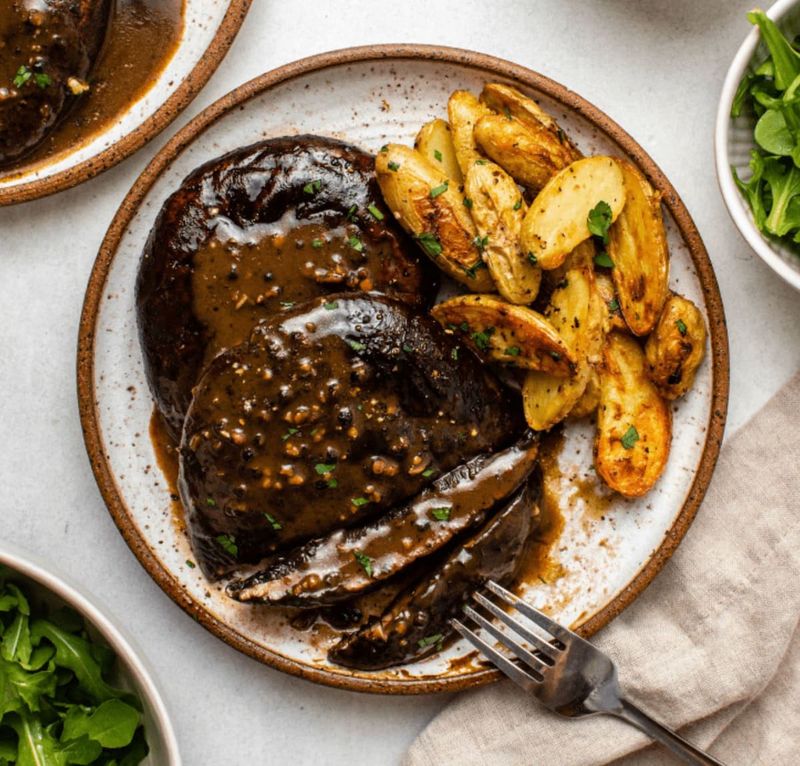 Use big grilled mushrooms for steak plates