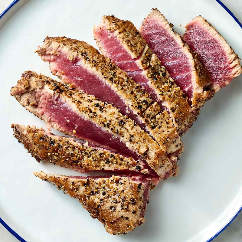 Pat fresh tuna dry before seasoning