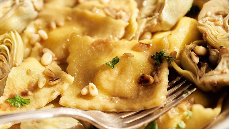 Baked White Fish and Herb Ravioli With Lemon Artichoke Sauce