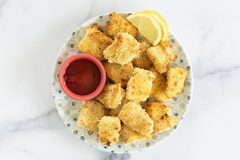 Baked haddock-style fish nuggets with tartar sauce