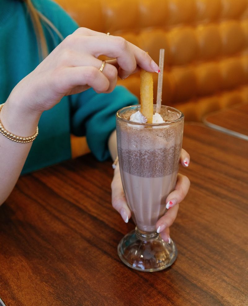 Fries dipped in a milkshake
