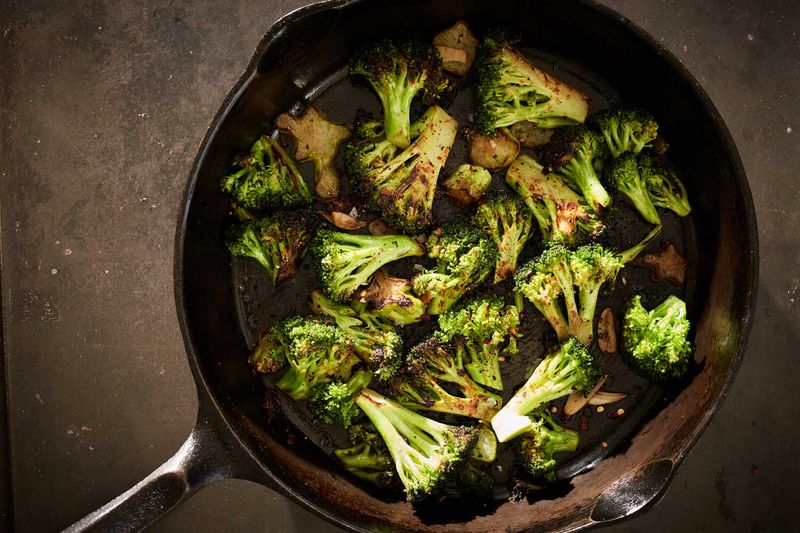 Charred Broccoli In A Hot Skillet