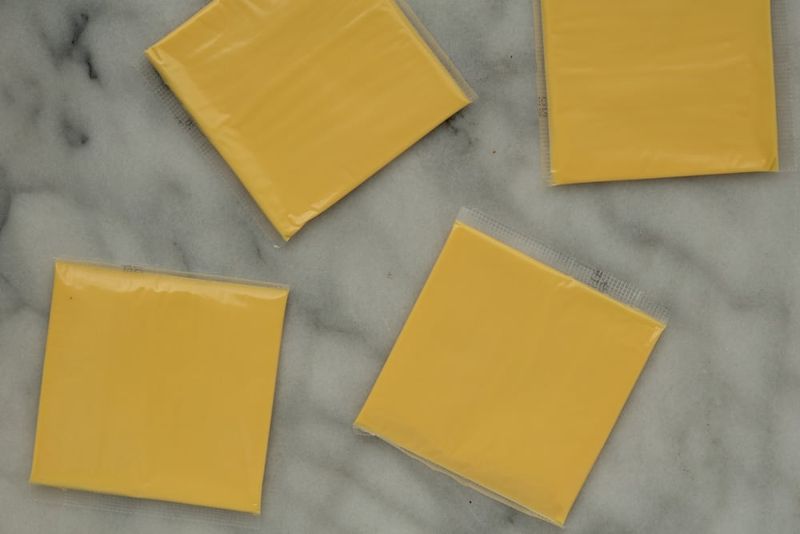 Processed cheese product slices
