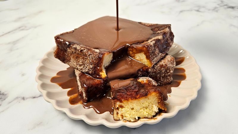 Churro French Toast Casserole with Mexican Chocolate Drizzle