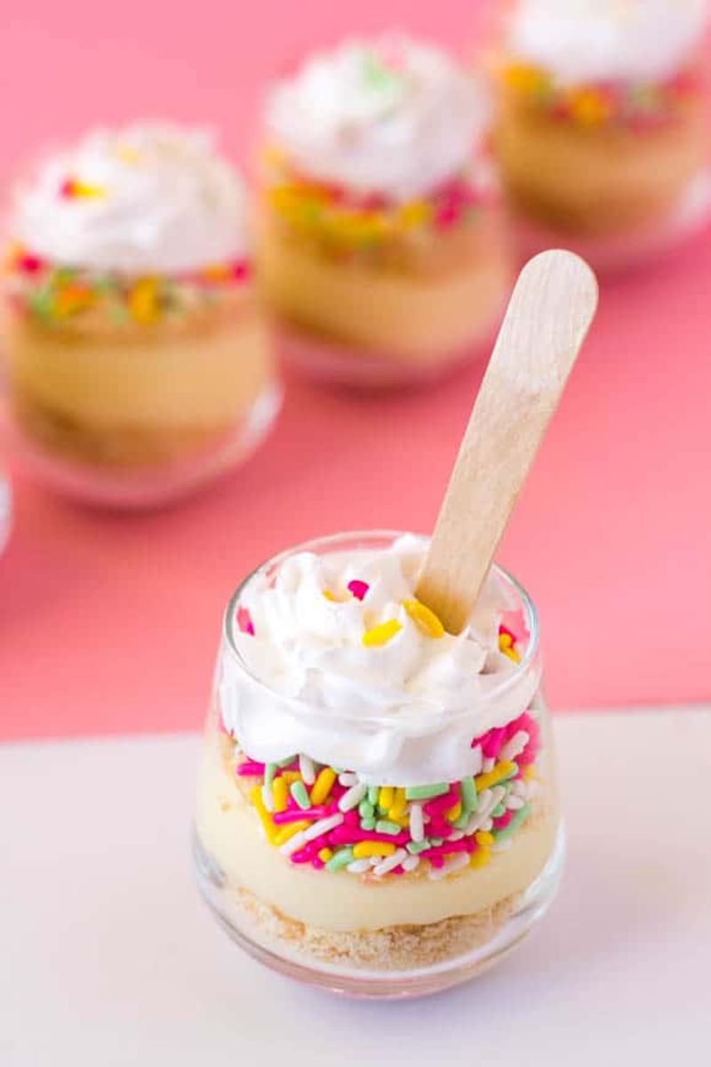 Vanilla Pudding with Whipped Cream and Sprinkles