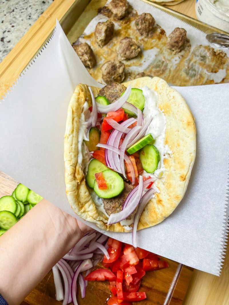 Sheet Pan Meatballs with Tomato Salad and Green Sauce