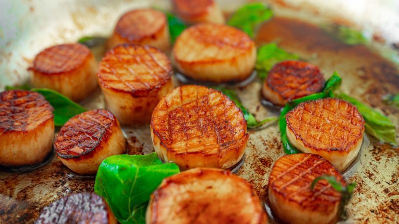 Slice king oyster mushrooms into scallops