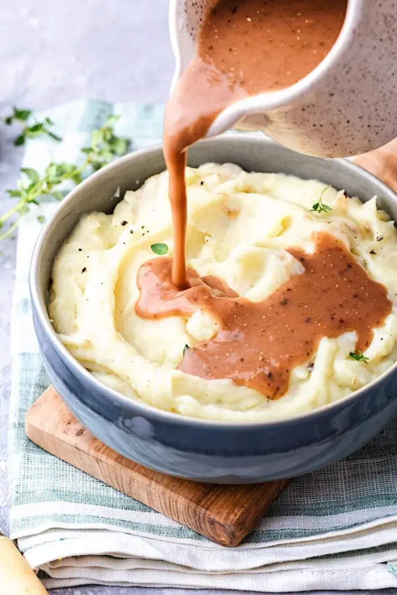 Onion Gravy Over Mashed Potatoes