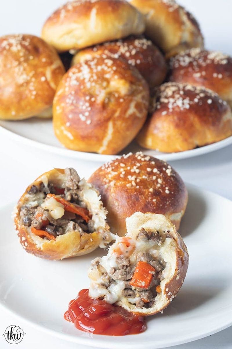 Cheesesteak-stuffed pretzel rolls