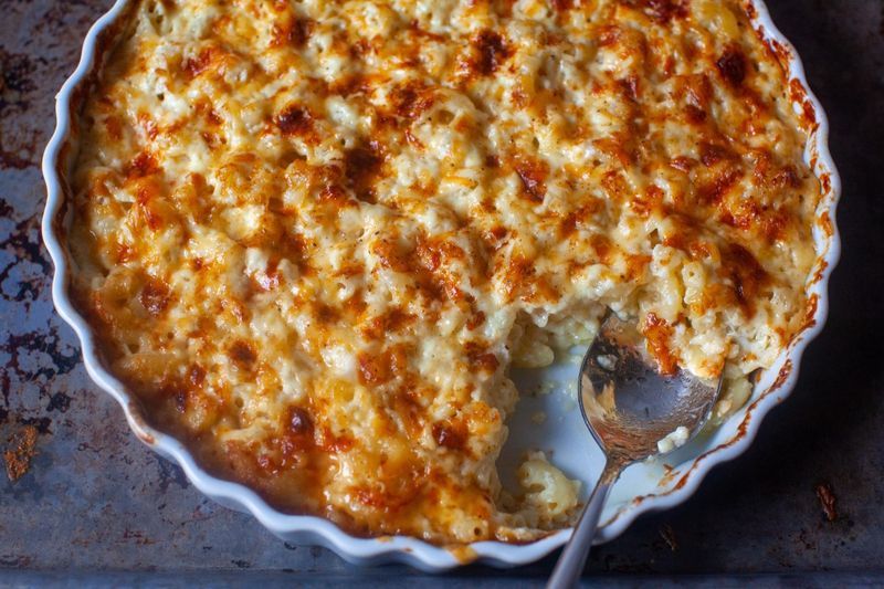 Mac and cheese baked until the edges crisp