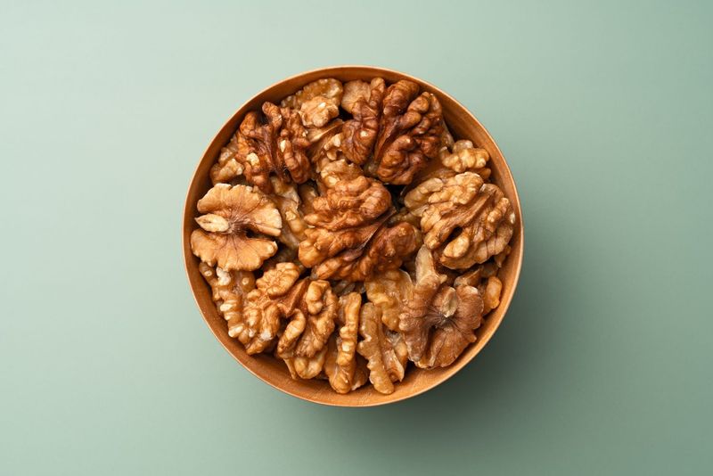 Walnuts with a piece of fruit