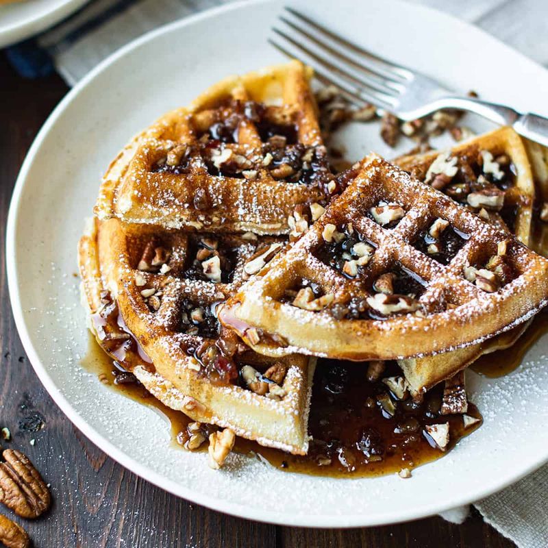 Waffles with pecans and syrup