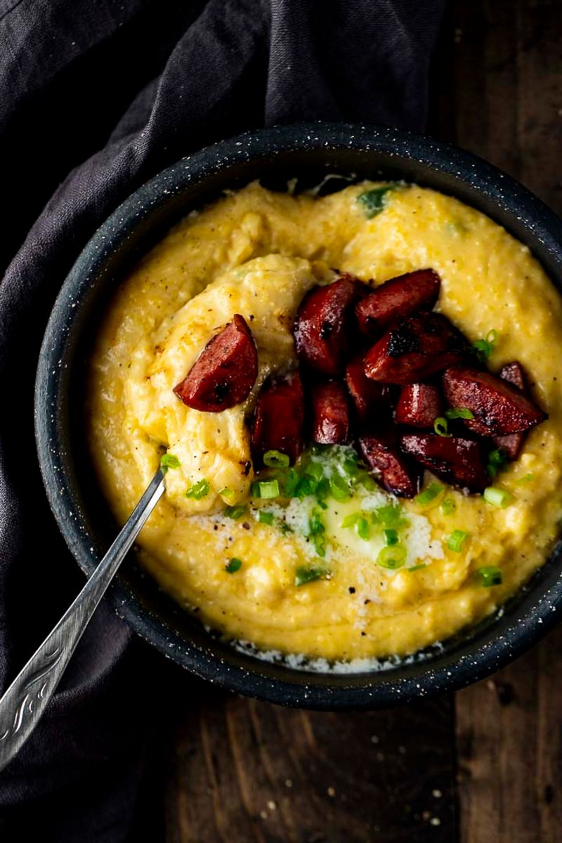 Sausage and Eggs Over Cheddar-Parmesan Grits