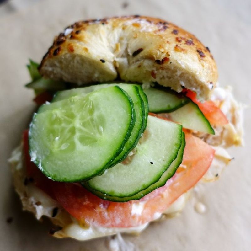 Salt Bagel With Tomato, Cucumber, and Cream Cheese