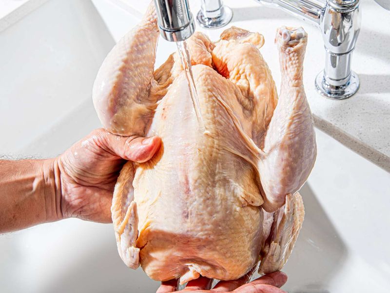 Rinsing Raw Poultry In The Sink