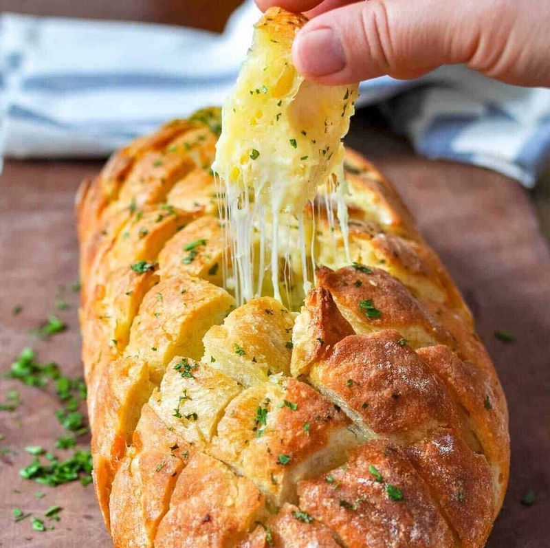 Stuffed Garlic Bread With Cheese and Herbs