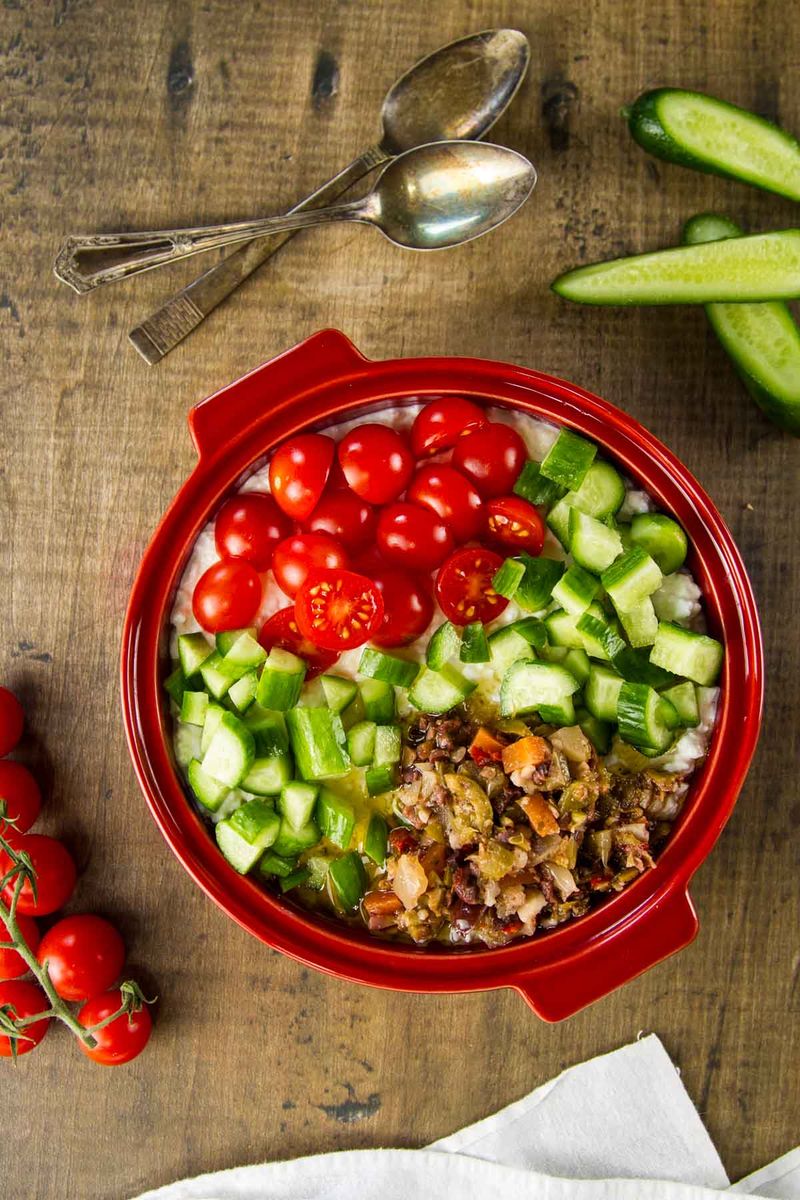Cottage cheese bowl with tomatoes and herbs