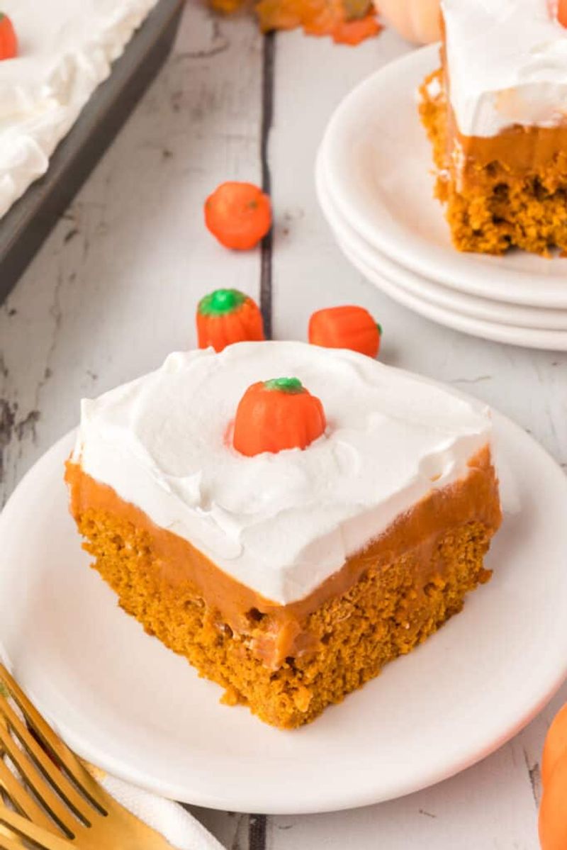 Pumpkin Spice Poke Cake With Cream Cheese Frosting