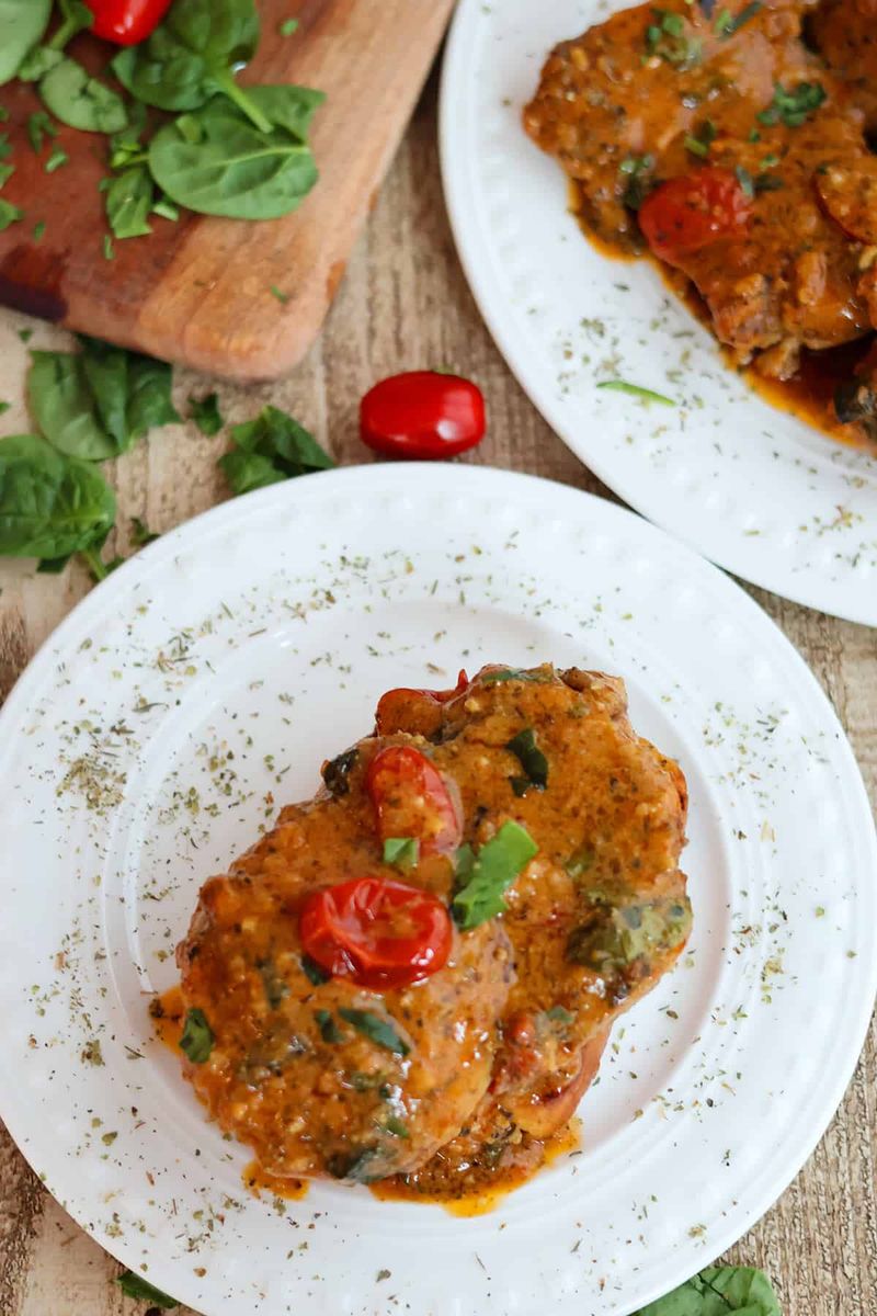 Tuscan Chicken Thighs with Tomatoes and Garlic
