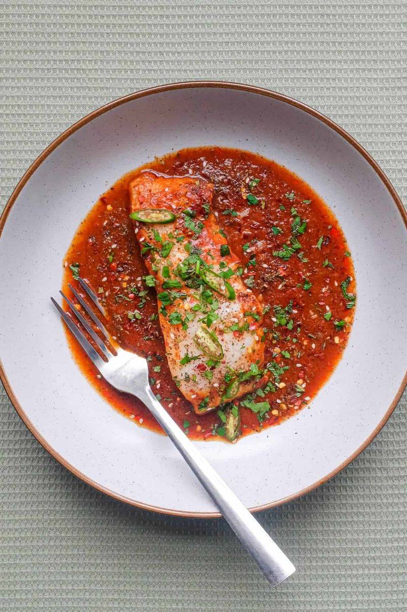Filet of fish with Creole-style tomato sauce