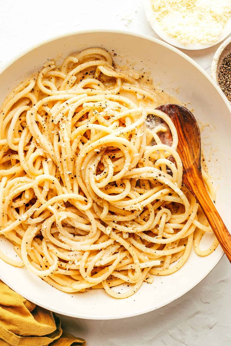 Let pasta drain briefly, but do not let it sit