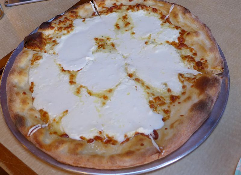 White Pizza That Rivals Their Red Sauce Masterpieces