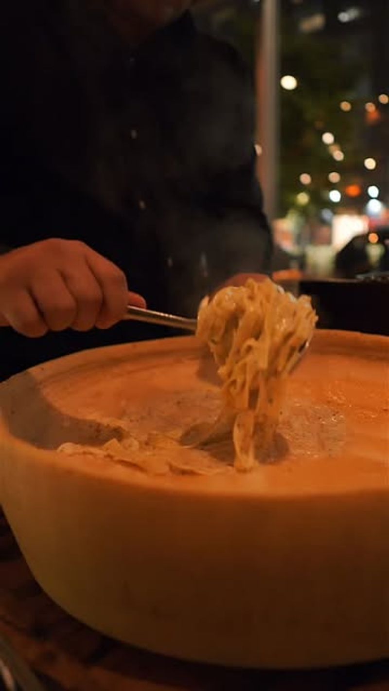 Cheese Wheel Pasta Toss