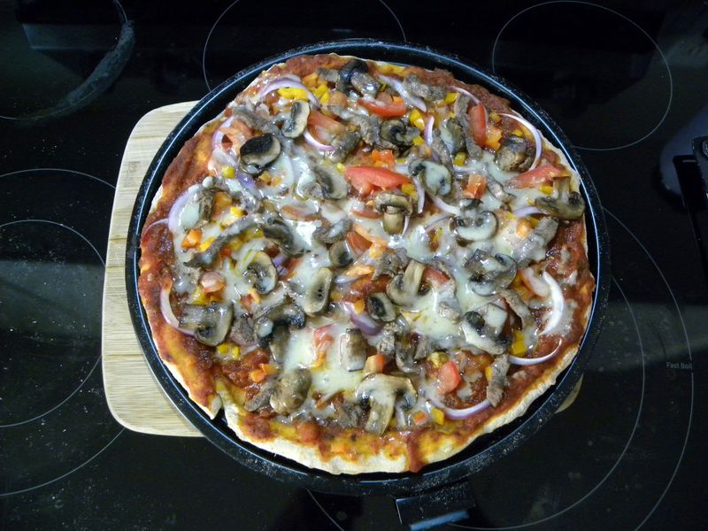 Frozen “loaded” pizzas