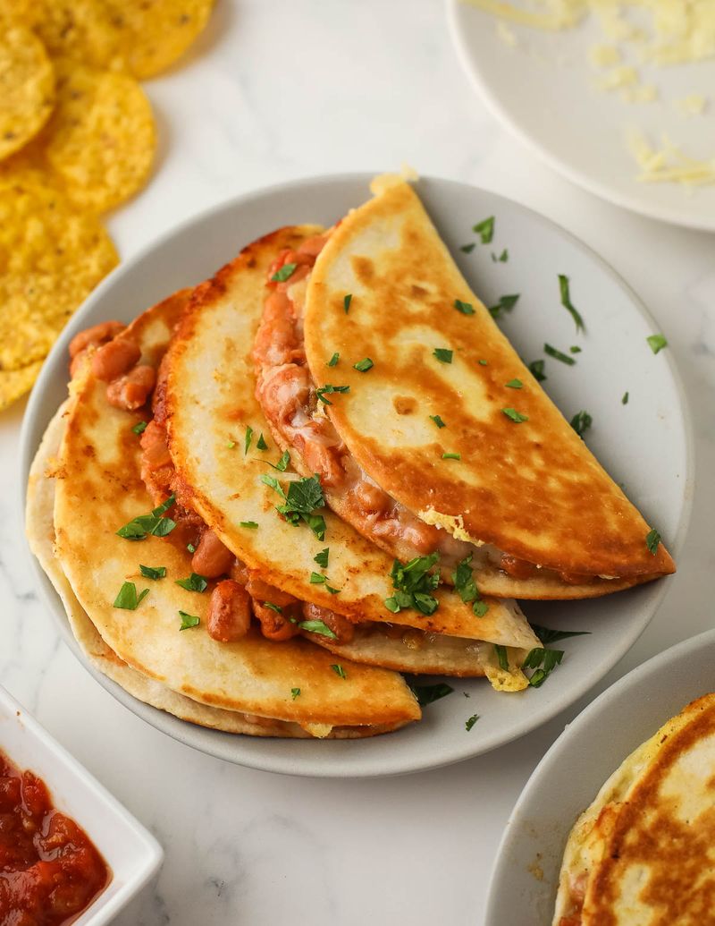 Pinto Bean Tacos With Charred Peppers and Onions