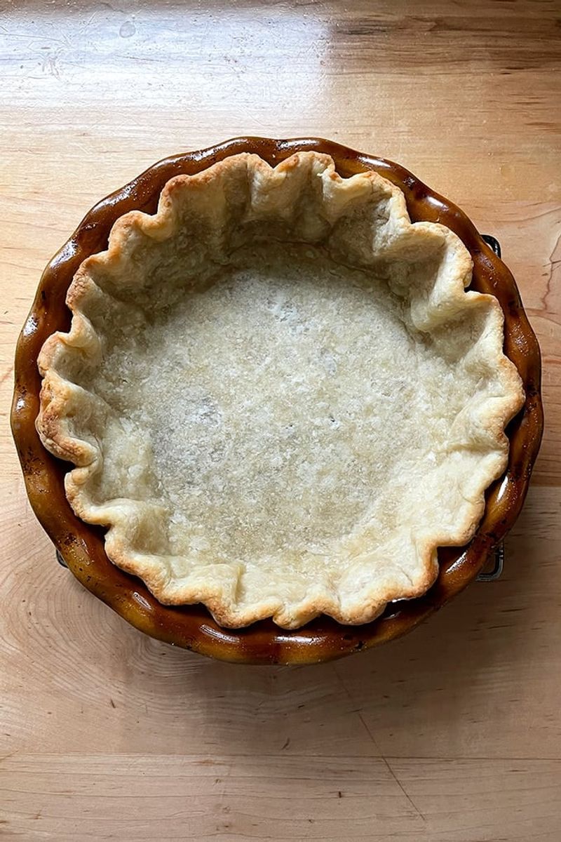 Chill the shaped crust before baking