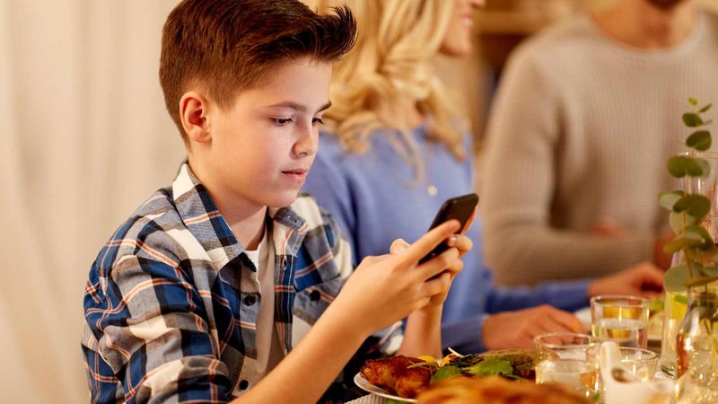 Kids setting and clearing the table