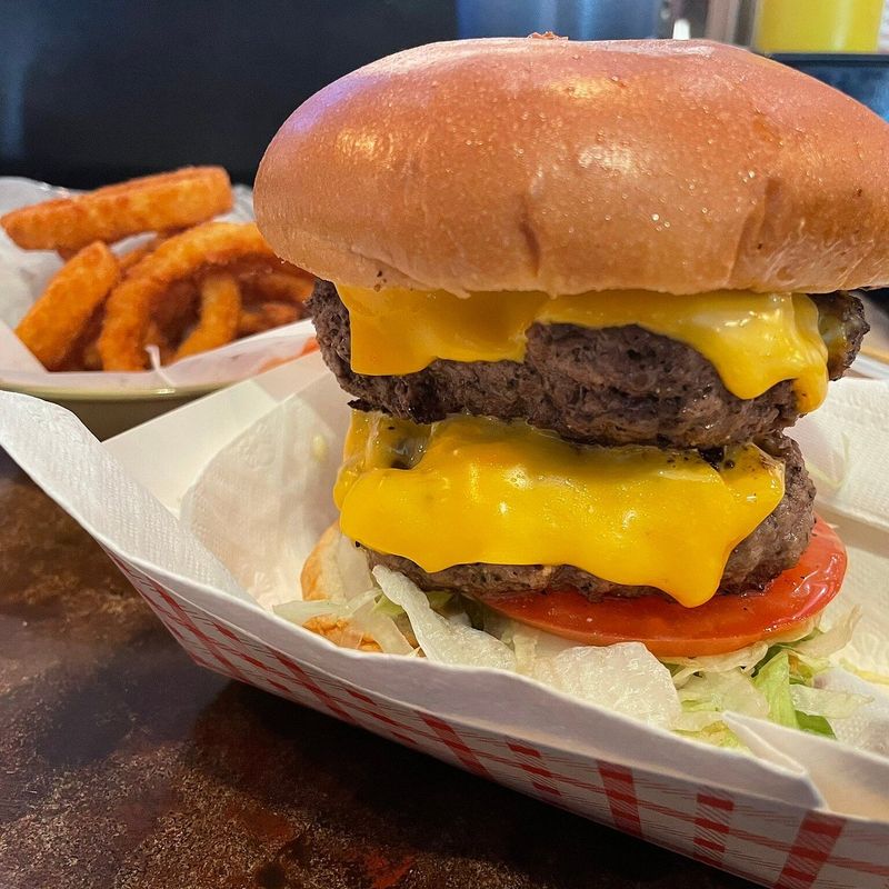 Nebraska - Stella’s Bar and Grill Runza Inspired Burger with Cottage Fries