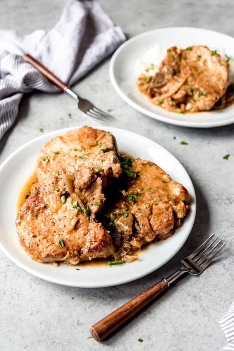 Alabama — Smothered Pork Chops with Rice and Gravy