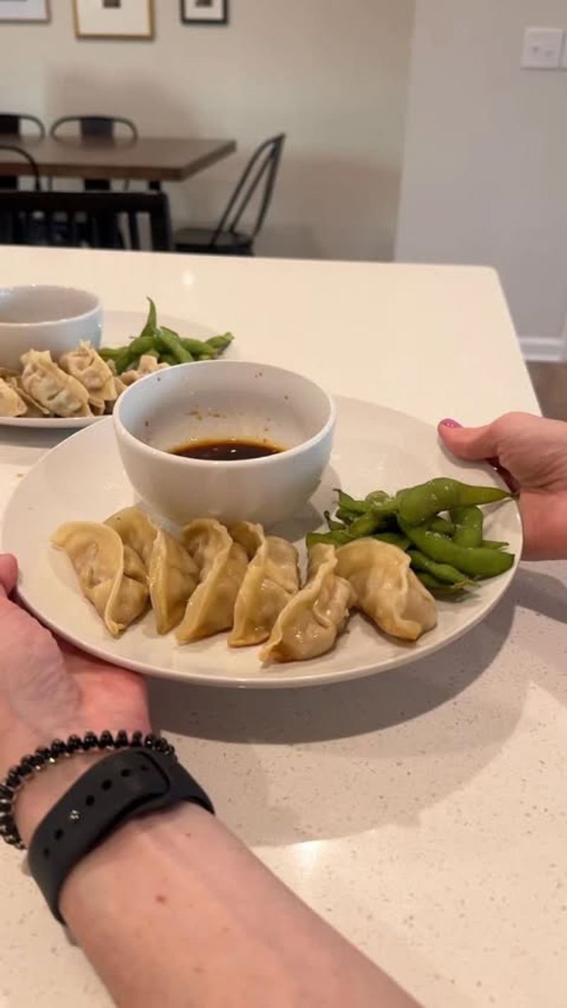 Pork Potstickers With Chili Onion Crunch and Edamame