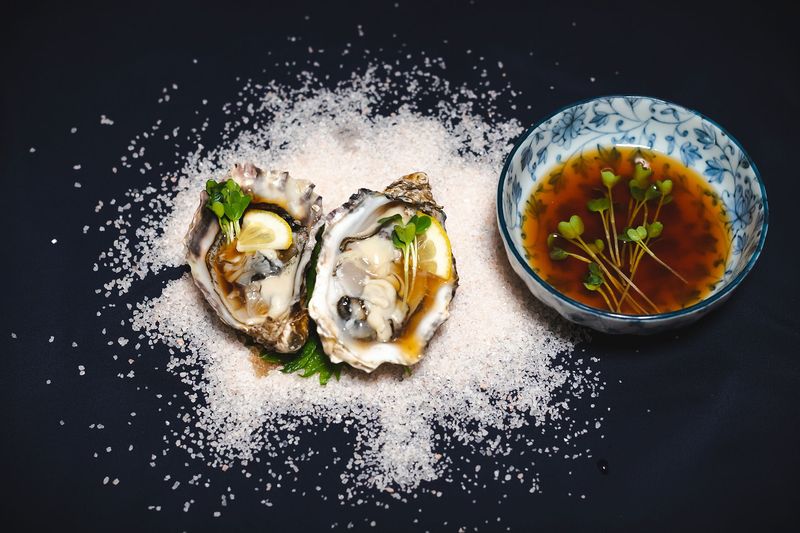 Raw oyster-style items (nama kaki)