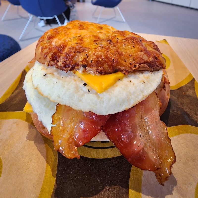 Einstein Bros. Bacon Egg & Cheddar on Asiago Bagel
