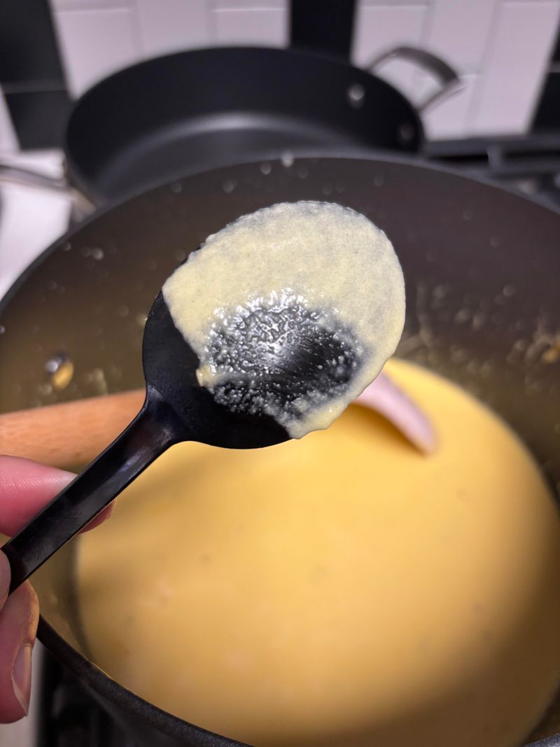 The cheese breaks in a sauce